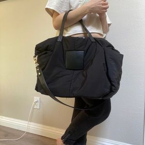 Puff black nylon handbag